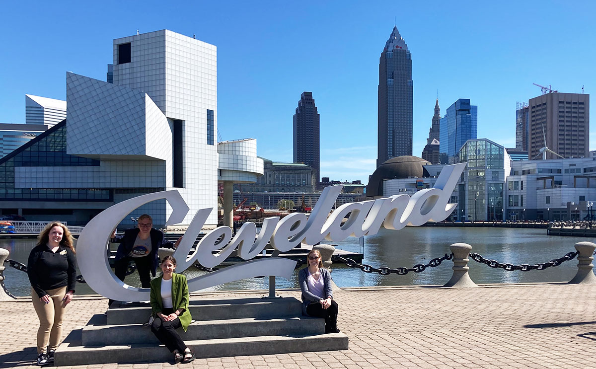 BW hospitality students with Cleveland sign