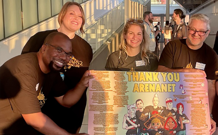 Amschlinger and her ArenaNet colleagues celebrate a game expansion