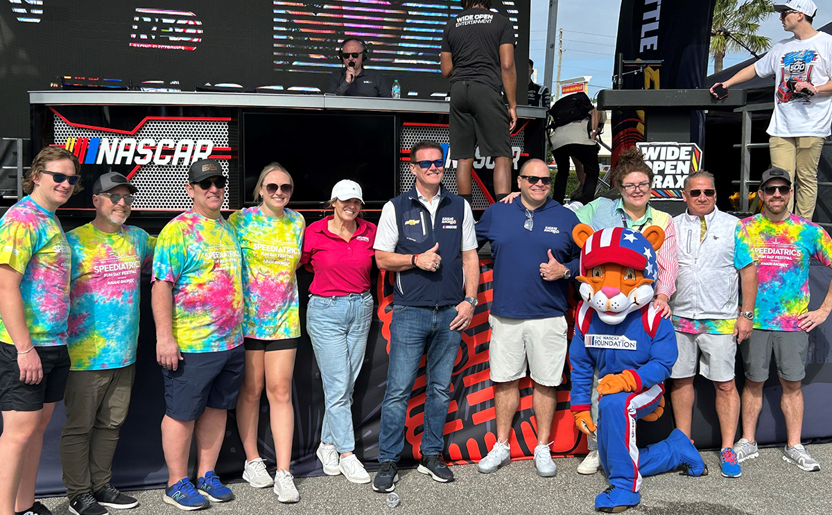 Kim DeCredico’96 (third from right) at Speediatrics Fun Day Festival