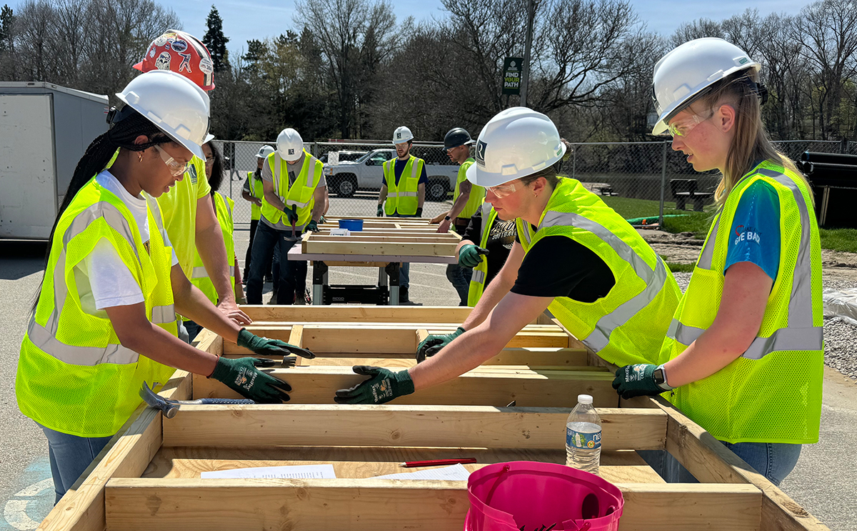 BW engineering students at the Wallace Lake construction site participating in a hands-on Regency Construction Academy lab activity in Spring 2024.