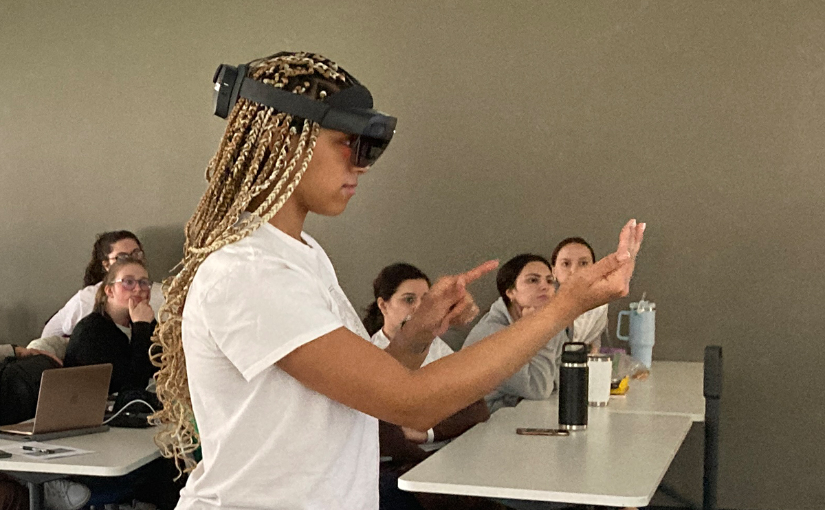 Tiana Card '24 utilizes the HoloLens in a BW nursing class