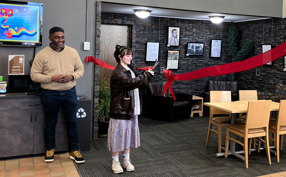 Sarah Burger cuts the Ribbon on Lawson Exhibit.