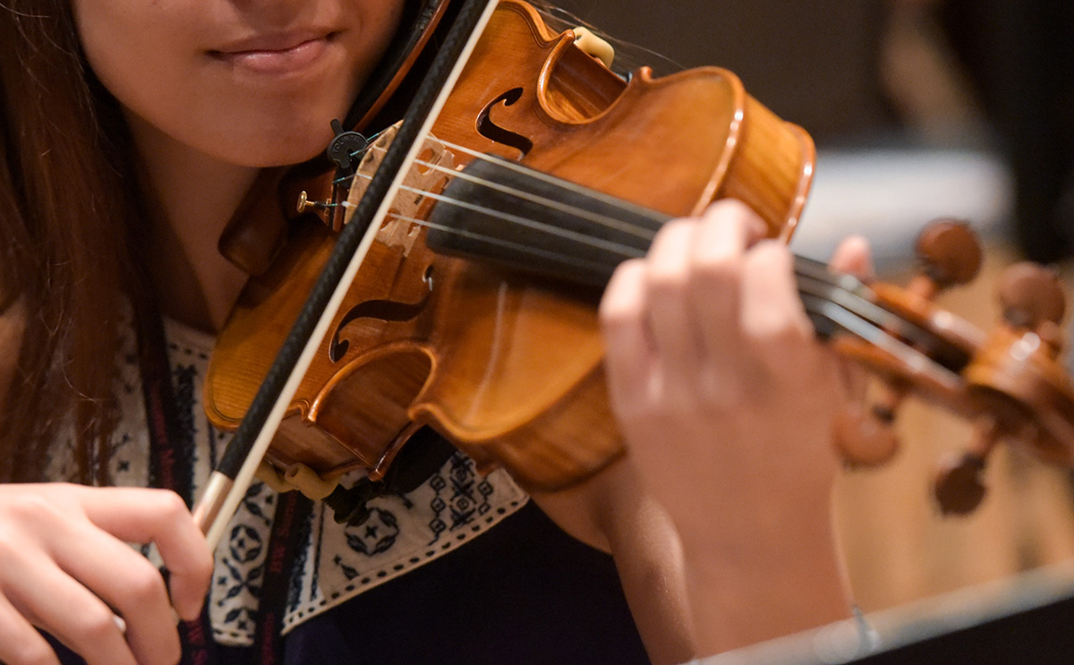 Hands playing violin