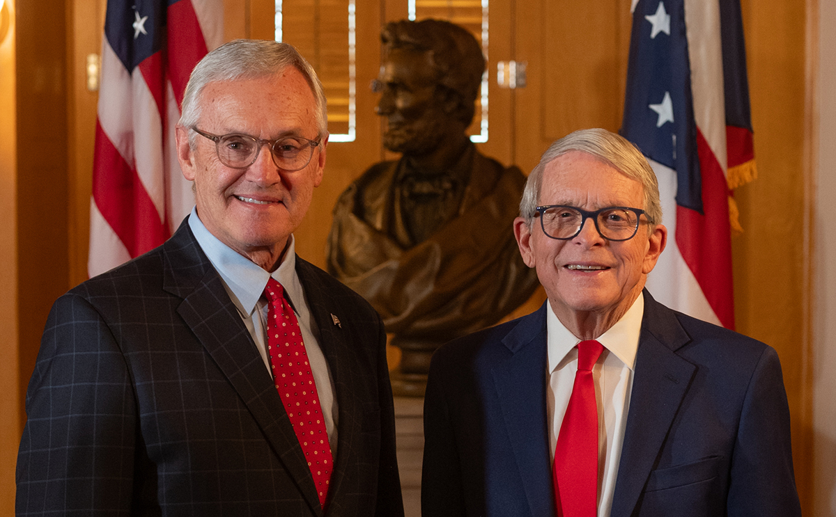 Jim Tressel (left) and Gov. Mike DeWine